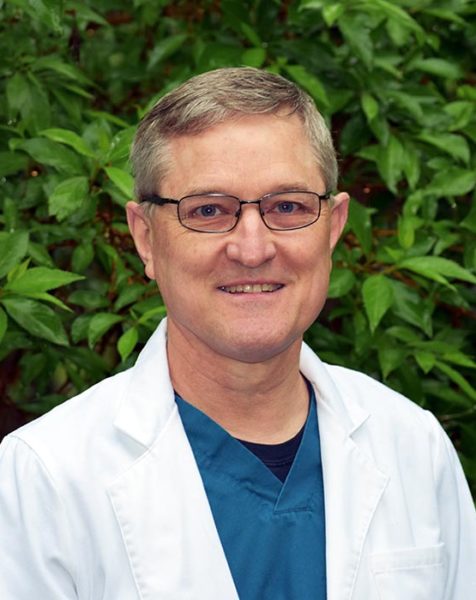 Portrait of Dr. K.C. Sykora, Lead Dentist & Practice Owner